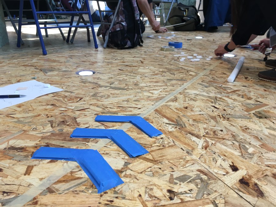 A close-up of the chevron pattern that creates a tactile wayfinding strip on sidewalks